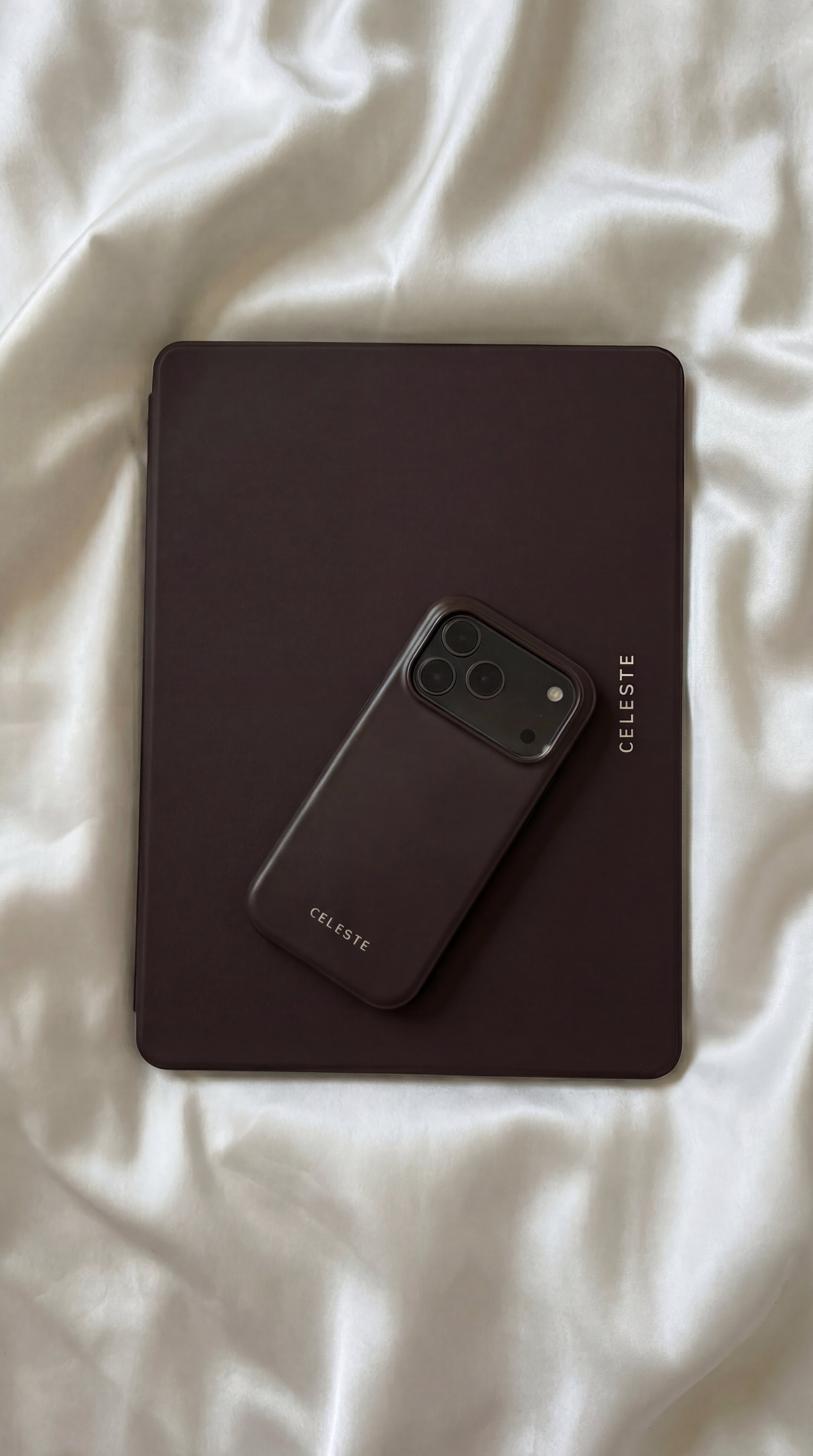 Phone case with 'Celeste' branding on a dark surface